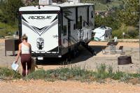 Woman and kid cutting through RV sites