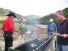 The cooks finally eat at the Vickers burger cookout