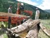 Jim Works the Woodmizer mill with Larry Vickers