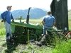 Jim and Paul ponder pulling John Deere tractor out of the mud