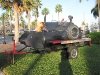19. Flaming pig roaster trailer for rent.