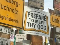 Meet Thy God at Signpost Forest, WatsonLake BC