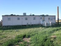 Rural Colorado Trailer Trash - Tires on Roof, Toilet on Porch