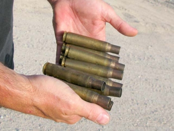 Collecting 50 cal. Brass Ammunition Rounds Slab City