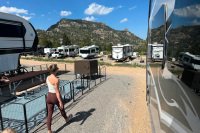 Woman and kid cutting through RV sites