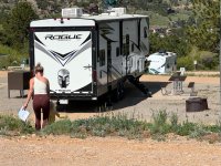 Woman and kid cutting through RV sites