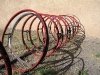 Bicycle rack made of recycled bike rims in T or C, NM