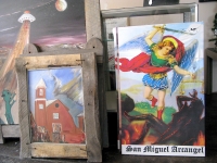 Art in the store of artist Charles Medina at El Santuario de Chimayo
