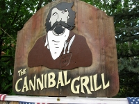 Cannibal Grill sign in Lake City, CO depicts Alfred Packer