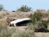 Slab City Resident Impromptu Burnt Camper Shell Shade Shelter