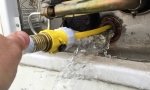 Rinse RV water heater with tank rinser hose adapter.