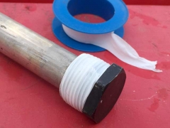 Apply plumber's tape when replacing RV water heater anode.