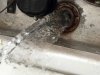 Drain RV water heater to replace check valve.
