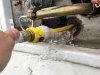 Rinse RV water heater with tank rinser hose adapter.