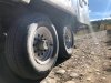Trailer tires on rocky road at Spread Creek