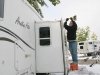 Clearing snoww off RV slideout at Fort Collins. CO KOA