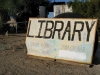 Slab City Lizard Tree Library Sign