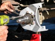 Titan Trailer Disc Brakes Installation, attach new backing plate