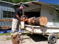 Jim Chainsaw Cuts Log Benches Handmade Workamping