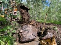Vickers Ranch Backhoe installing culvert
