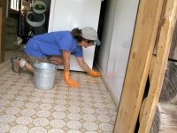 Rene spring cleaning at Vickers Ranch rec hall
