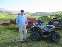 Jim working hay fields at Vickers Ranch