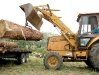 Jim loads log onto Woodmizer mill