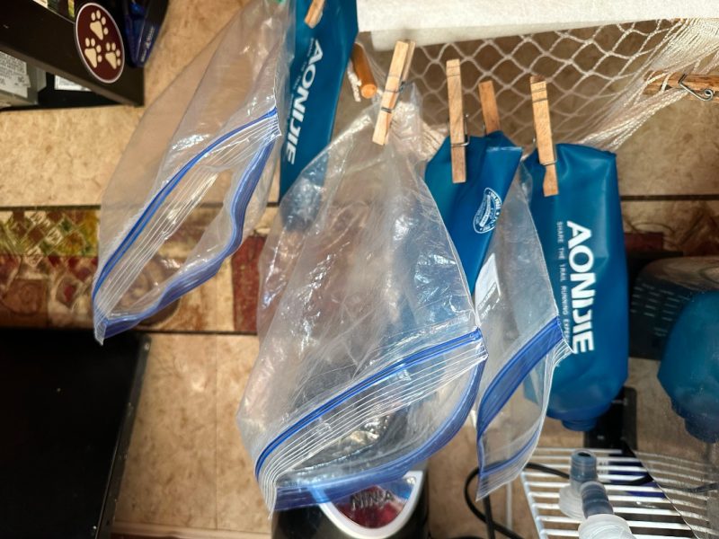 Recycled bags hanging in RV kitchen